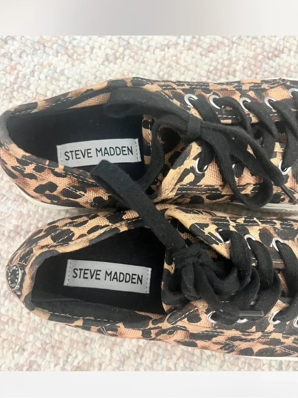 Steve Madden low top cheetah print sneaker.